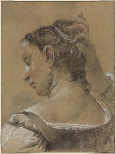 A Young Woman Fixing Her Hair