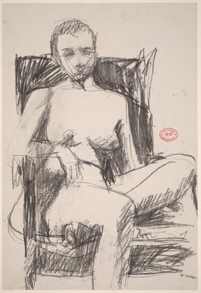 Untitled [female nude in a dark armchair]