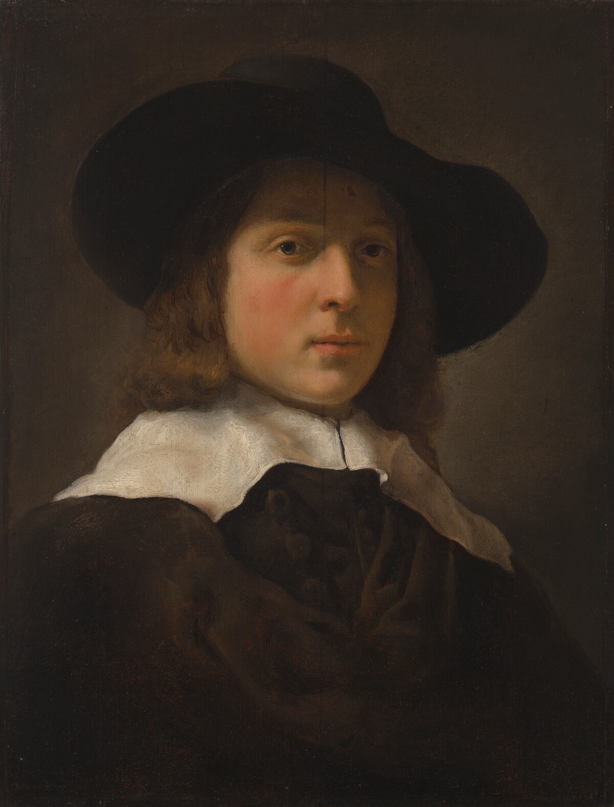 Head of a Young Man by Attributed to Rembrandt Workshop (possibly Govaert Flinck)