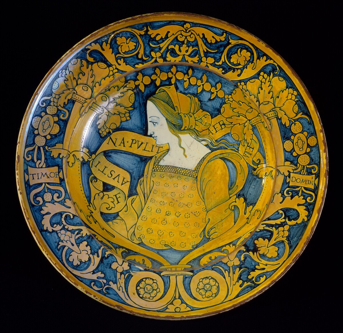 Large dish with border of floral scrollwork and cornucopias; in the center, profile bust of "Faustina" by Deruta 16th Century