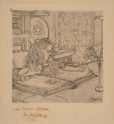 Charley Looking at an Album of Prints