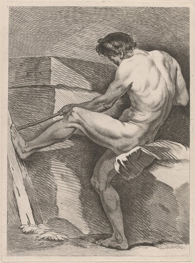 Man Pulling a Rope, His Foot Braced