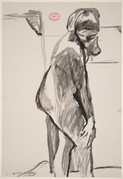 Untitled [female model standing in the studio and looking down]